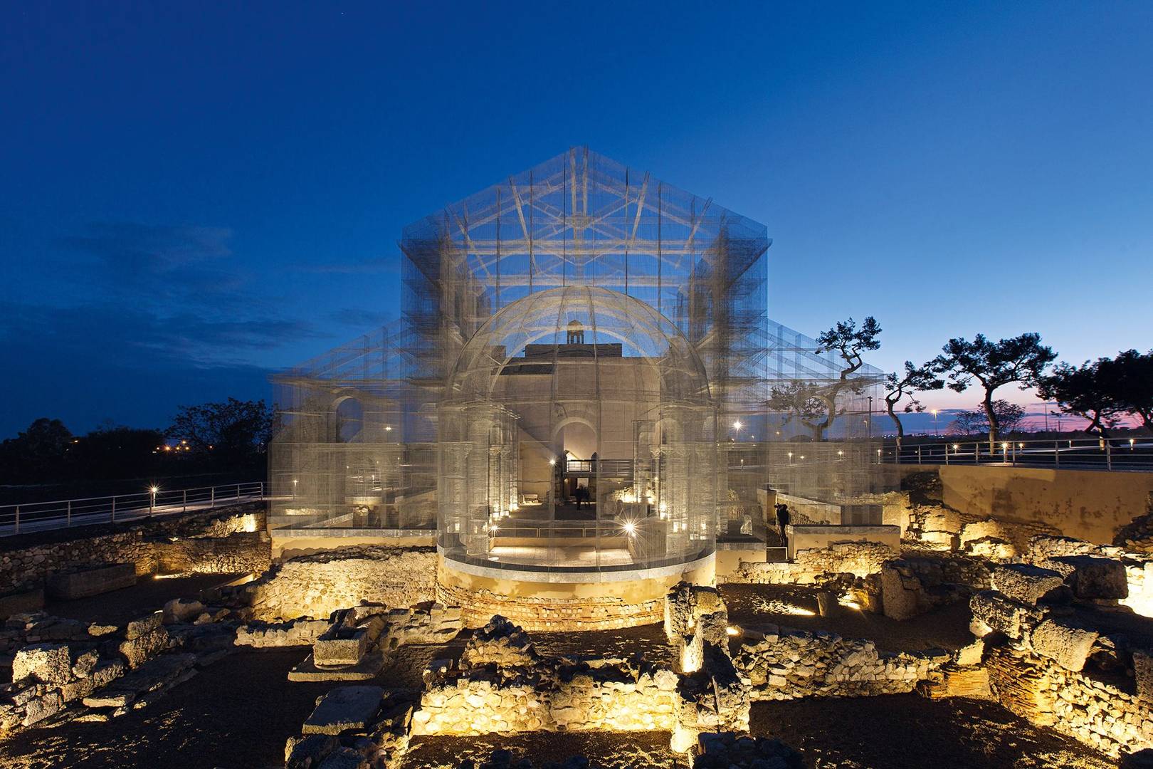 The artist using wires to raise the ghosts of ancient monuments from the ground