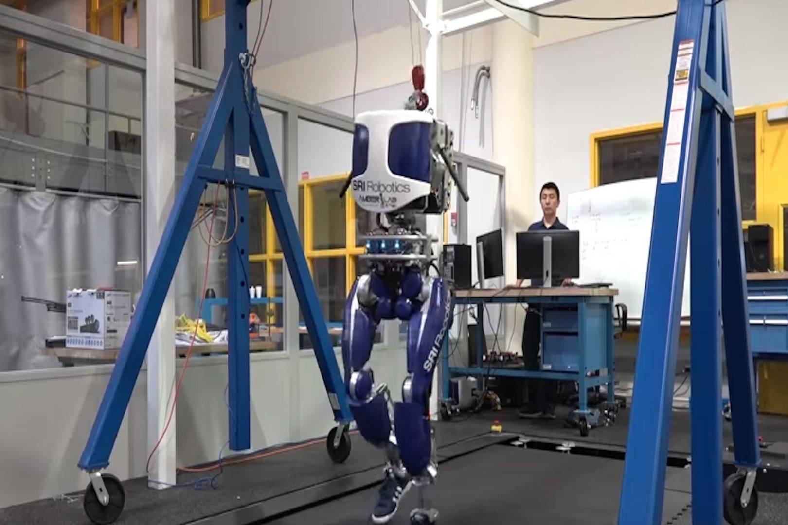 This strutting robot is strong, confident and has great shoes