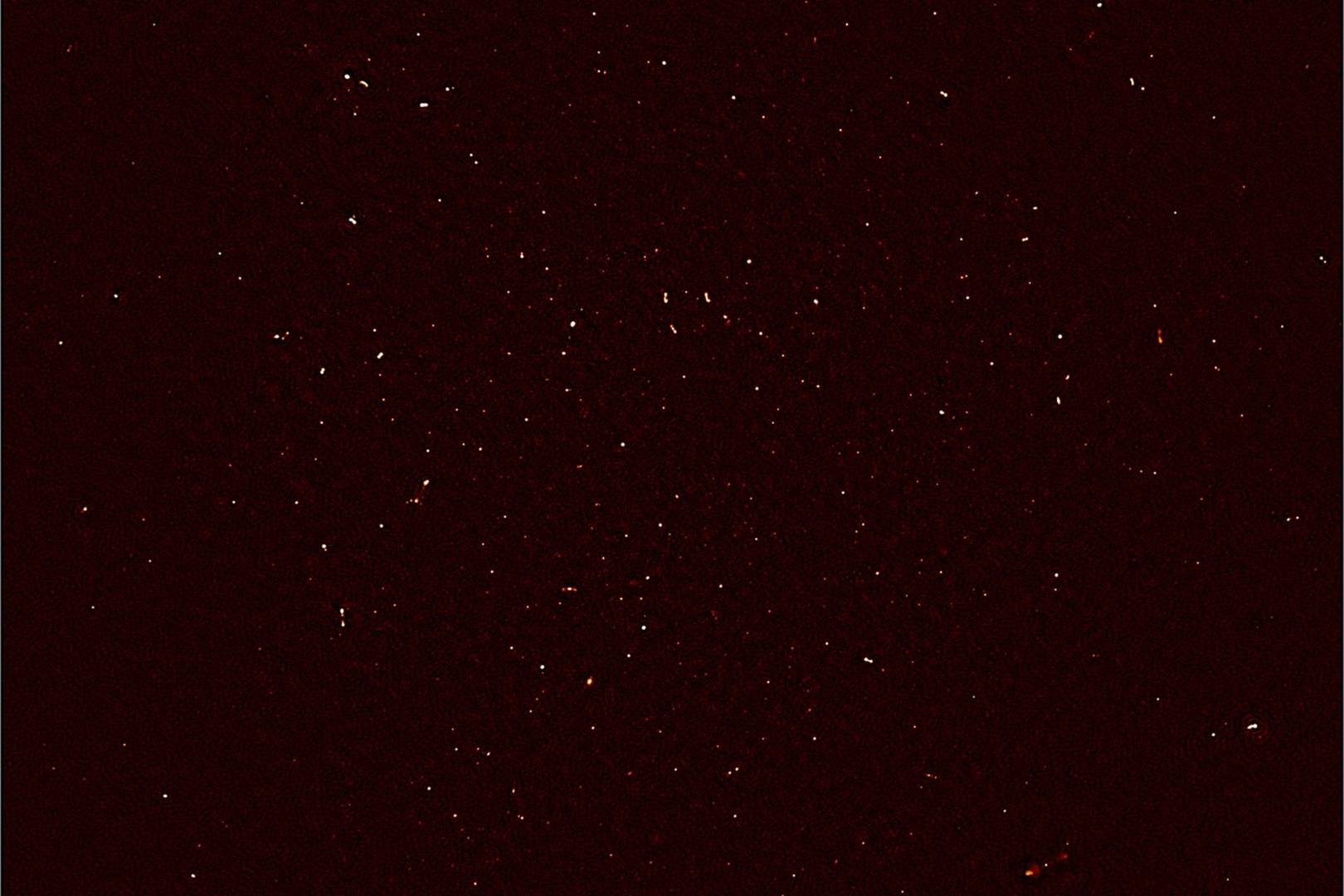 Super radio telescope images reveal 1,200 hidden galaxies