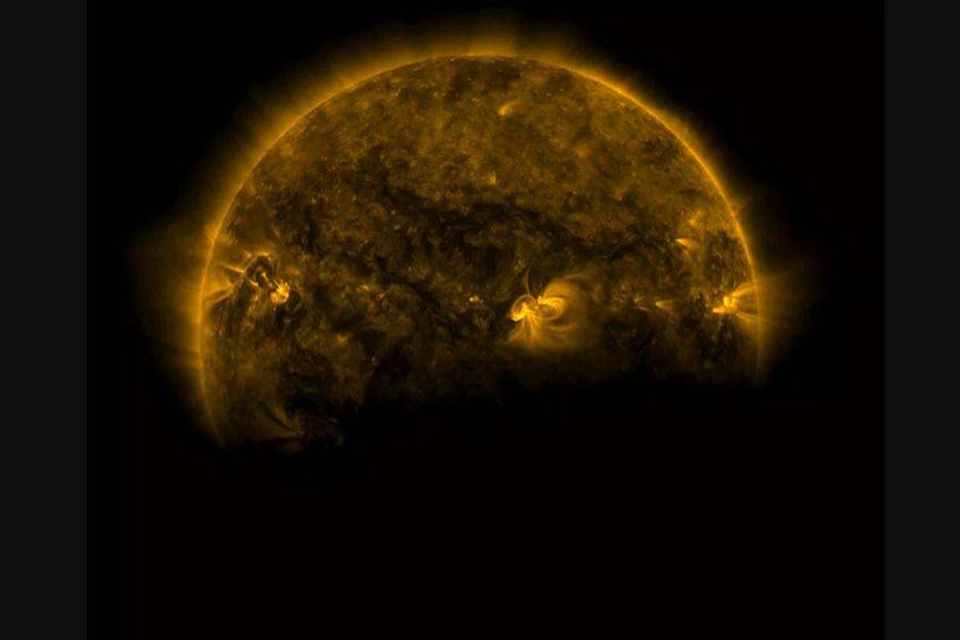 Nasa captures rare 'double eclipse' as the Earth and Moon cross the Sun