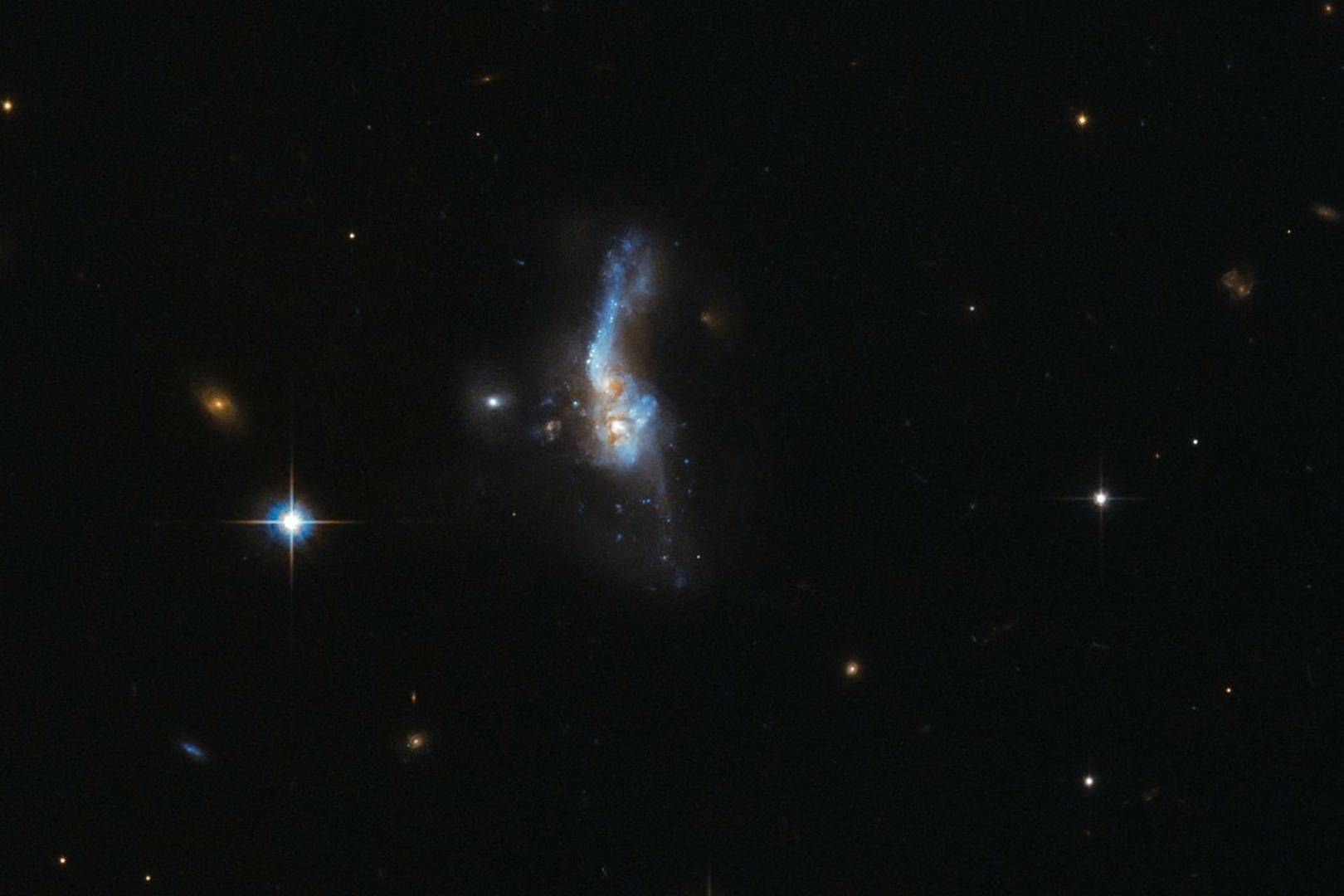 Galaxies collide in beautiful Hubble footage