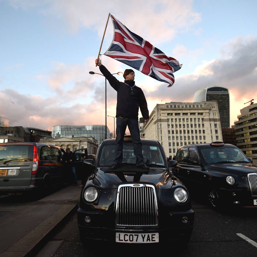 Image: Like the gilets jaunes, London's black-cab and Uber drivers rail against environmental policies