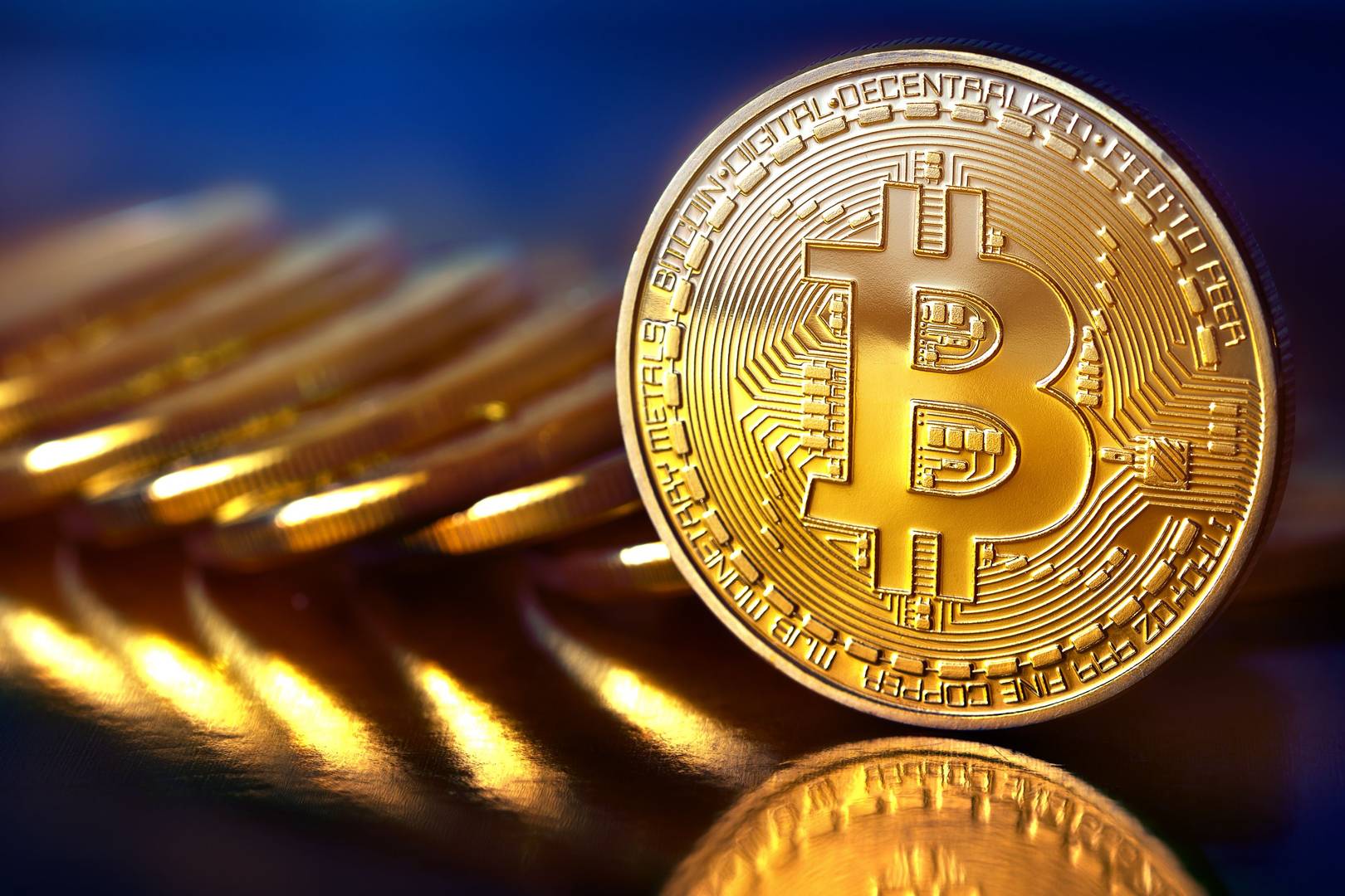 Bitcoin tops $1,000 after reaching three-year high