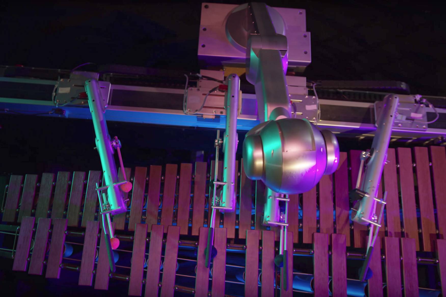 This robot uses deep learning to write and play its own music