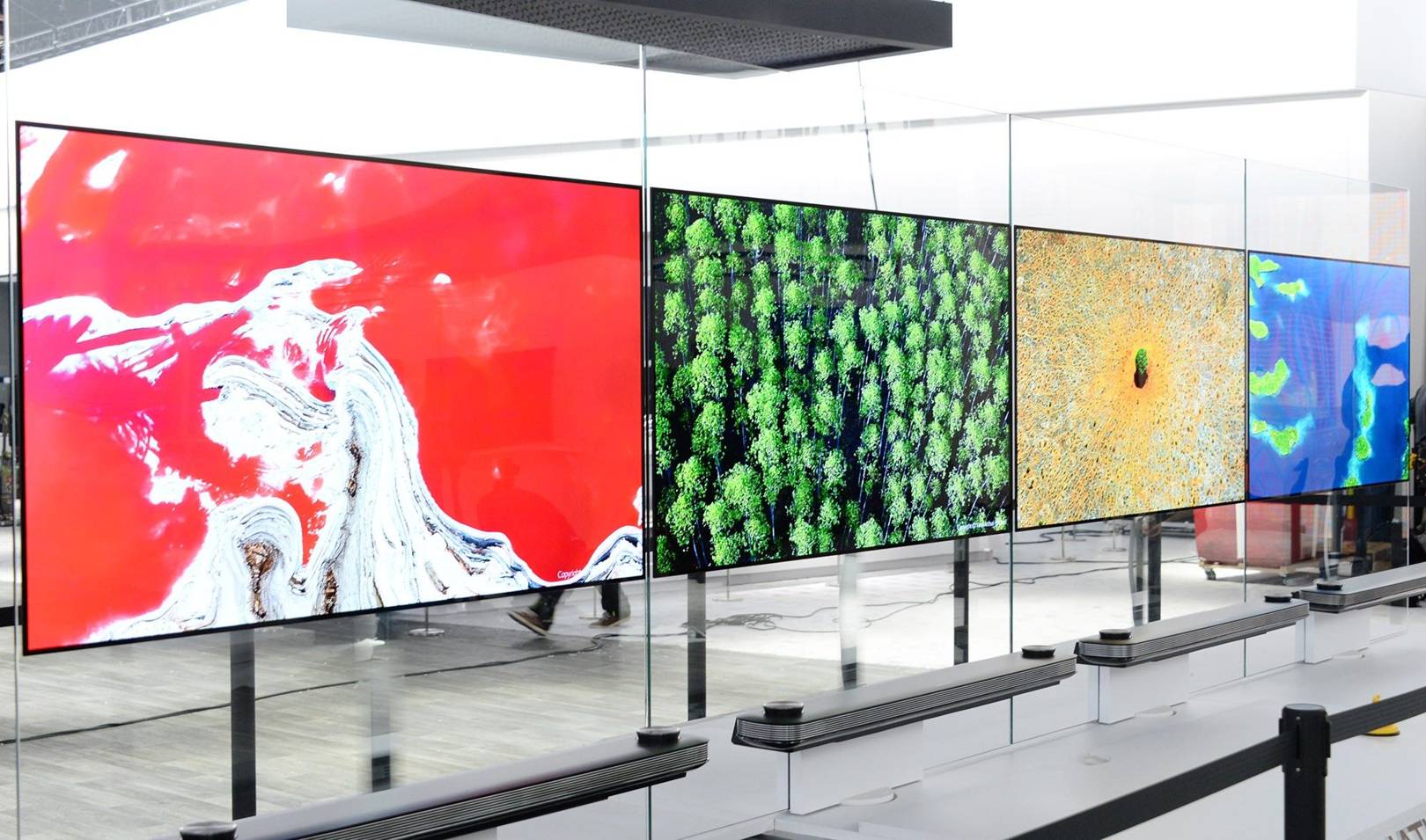 LG's 'blade-like' TV is as thin as four credit cards and hangs on the walls using just magnets