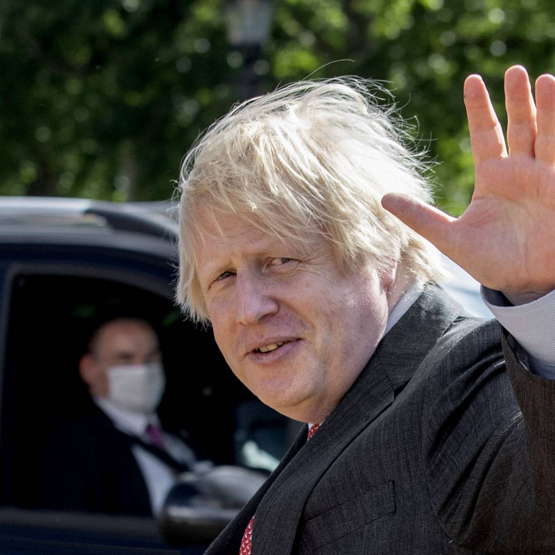 Image: Why aren't face coverings compulsory in the UK?